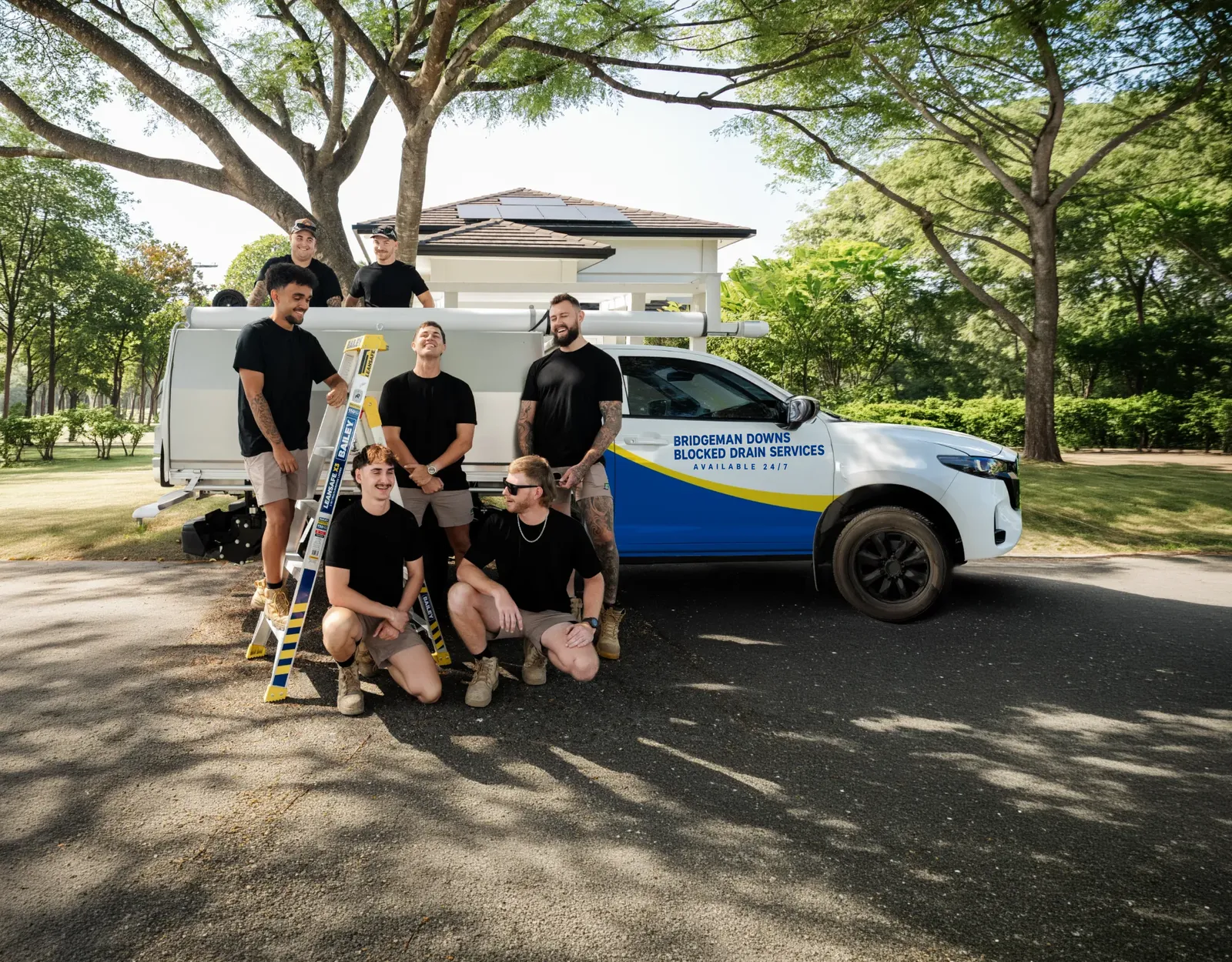 Bridgeman Downs Blocked Drain Services team and ute